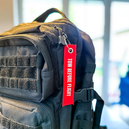 Schlüsselanhänger "Tow Before Flight"