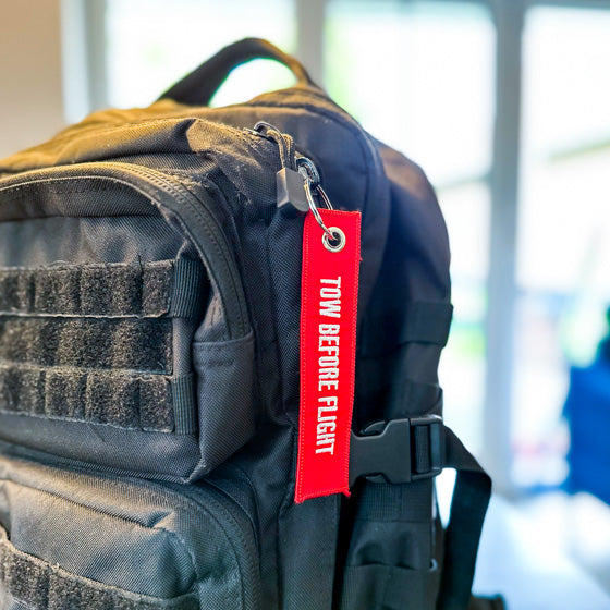 Schlüsselanhänger "Tow Before Flight"